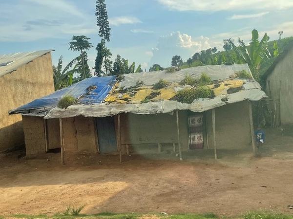 Mud-hut-with-metal-roof-10-25